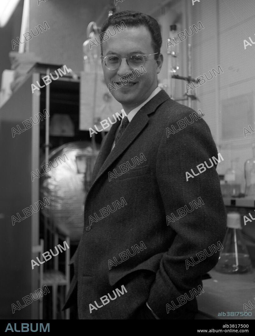 Glaser, March 20, 1963. Donald Arthur Glaser (September 21, 1926 - February 28, 2013) was an American physicist, neurobiologist, and Nobel Prize Physics laureate (1960) for his invention of the Bubble chamber used in subatomic particle physics. A bubble chamber is a vessel filled with a superheated transparent liquid (most often liquid hydrogen) used to detect electrically charged particles moving through it. After winning the Nobel Prize, Glaser began to think about switching from physics into a new field and began to study biology doing experiments with bacterial phages, bacteria mammalian cells and studying the development of cancer cells. He automated the process of pouring out agar, spreading culture, and counting colonies of cells using a machine he called the dumbwaiter. It took photographs, administered chemicals, and had a mechanical hand to pick up colonies. As molecular biology became more dependent on biochemistry, Glaser again considered changing fields and began working on computational modeling of the visual system and visual psychophysics. He died in his sleep, in 2013, at the age of 86.