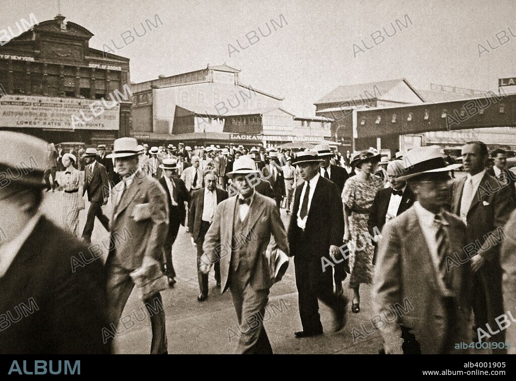 Commuters from New Jersey crossing West Street from the Hoboken ferry, New York, USA, early 1930s. On the way to their jobs in Manhattan.