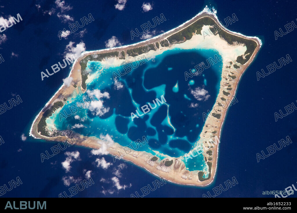 Atafu Atoll, Tokelau, Southern Pacific Ocean At roughly eight kilometres wide, Atafu Atoll is the smallest of three atolls and one island (Nukunonu and Fakaofo Atolls to the southeast and Swains Island to the south are not shown) comprising the Tokelau Islands group located in the southern Pacific Ocean.