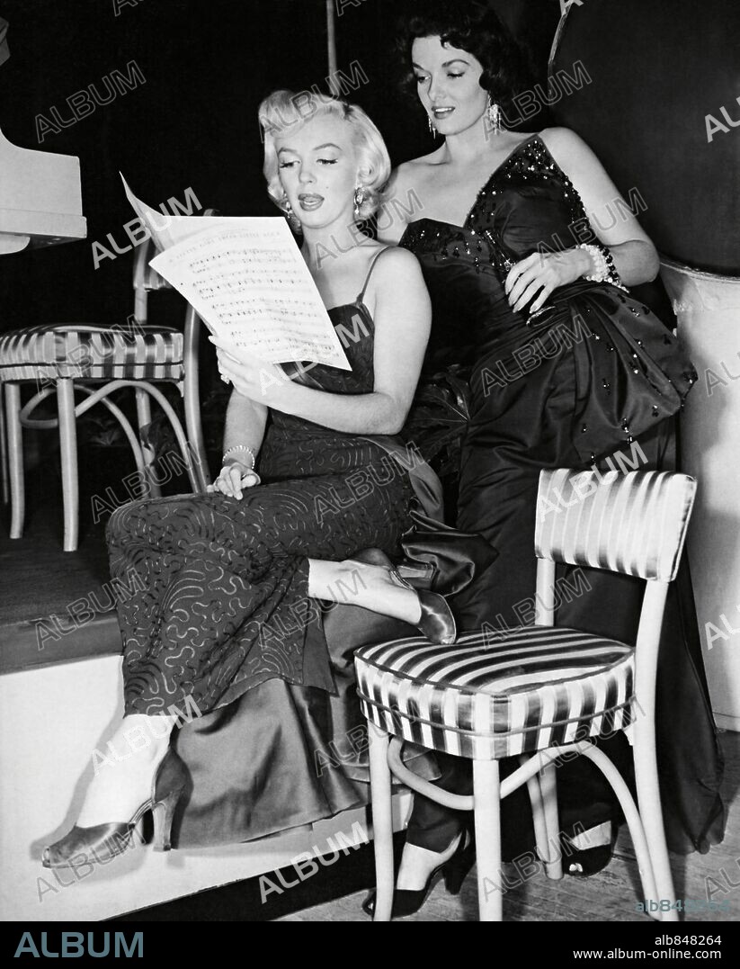 NORMA JEAN BAKER and JANE RUSSELL. JANE RUSSELL and MARILYN MONROE in GENTLEMEN PREFER BLONDES, 1953, directed by HOWARD HAWKS. Copyright 20TH CENTURY FOX.
