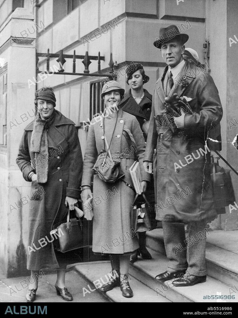 Flying Family Off To Cairo -- Lord Londonderry, with Lady Londonderry (extreme left) and their daughters, leaving their London residence, Londonderry house, this morning, Dec 13.The Marques of Londonderry, who is the secretary of state for air with his wife and daughters left London today, Dec 13, en route for Cairo where they will spend their Christmas holiday. At the end of the vacation, the Marquis will start on an aerial tour of all the R.A.S. depots outside the British isles. December 13, 1933. (Photo by Associated Press Photo).