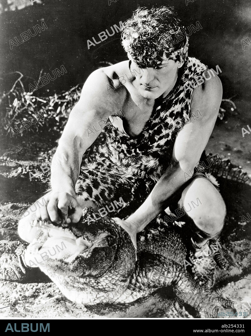 FRANK MERRILL in TARZAN THE MIGHTY, 1928, directed by JACK NELSON. Copyright MCA/UNIVERSAL PICTURES.
