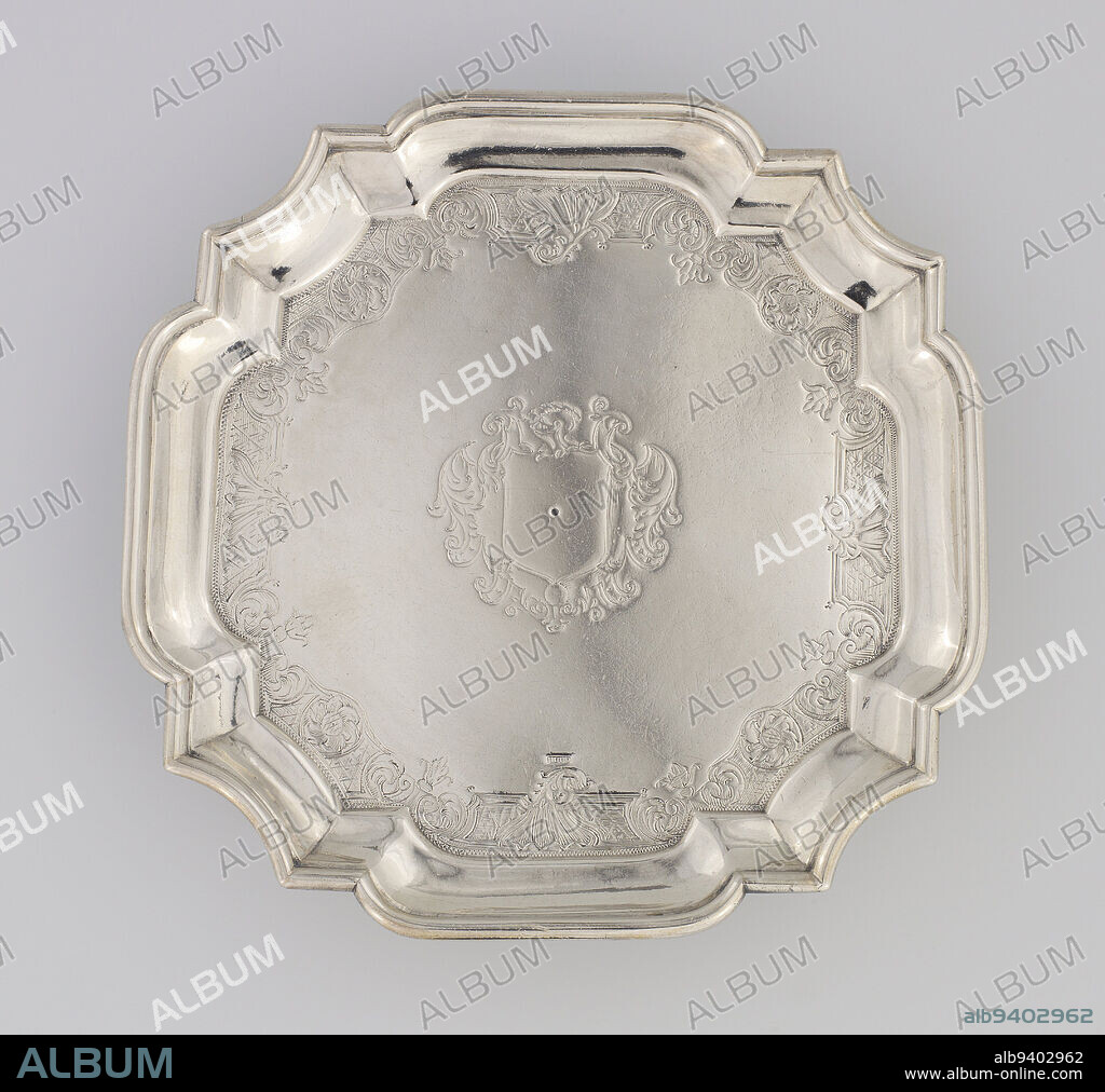 Salver, c. 1740-1750, Jacob Hurd, American, 1703-1758, 1 x 6 3/8 in. (2.5 x 16.19 cm), Silver, United States, 18th century, Jacob Hurd was one of five of the most prominent Boston goldsmiths between the 1720s and 1750 and was one of the most talented engravers of this period, influencing the designs of numerous others. His skill is evidenced in the delicately engraved border of this salver. Unfortunately, some of this fine work is no longer visible in the center cartouche's engraving as the original coat of arms or initials have been removed by a previous owner. Small waiters such as this were often used as stands for coffeepots to prevent the hot vessel from damaging the surface of the table beneath.