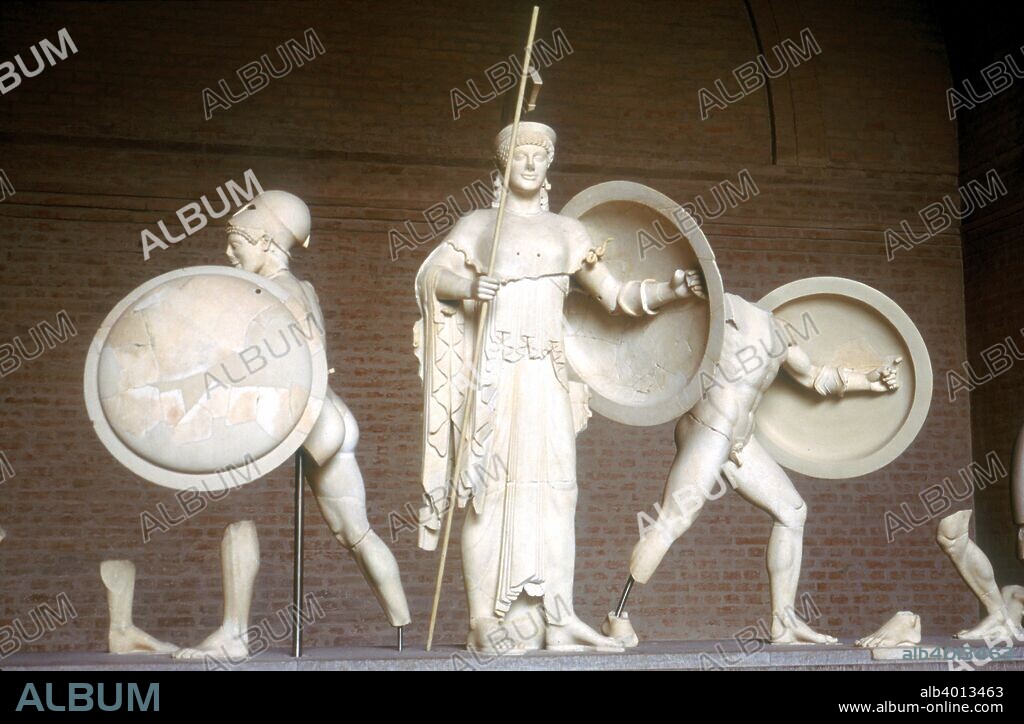 Reconstruction of part of the West Pediment of the Temple of Aphaia, Aegina, Greece, c500-480 BC. Athena is pictured in the centre. This item is now in the Munich Glyptothek Germany.