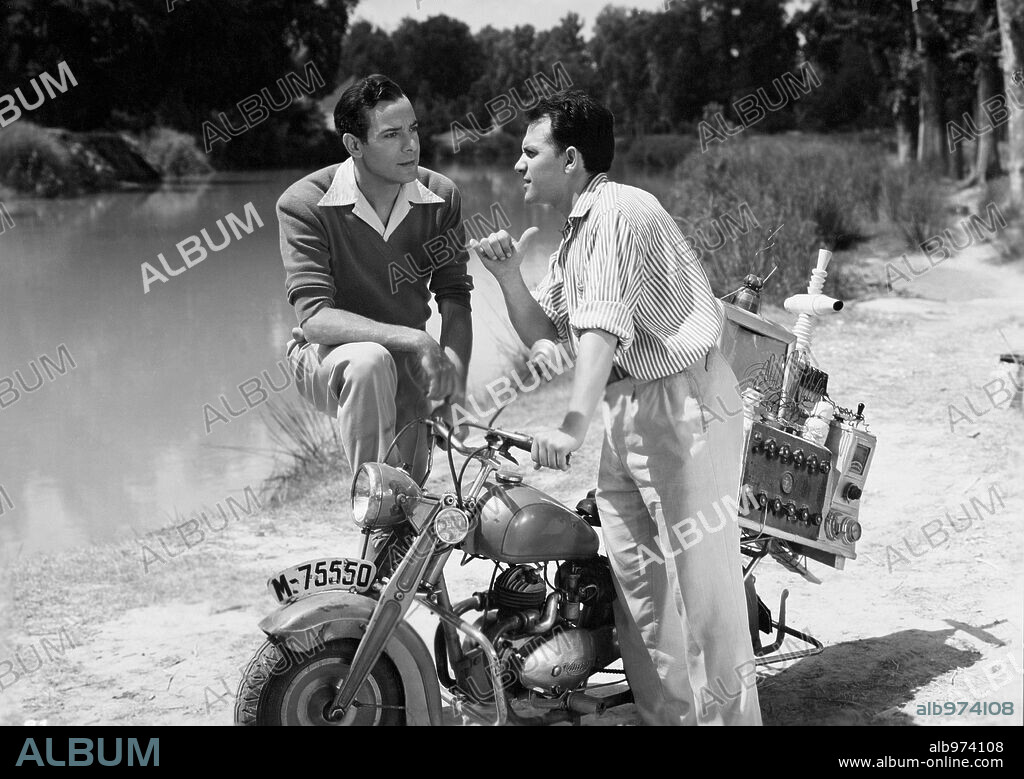GEORGES GUETARY and JOSE LUIS OZORES in PLUME AU VENT, 1952, directed by LOUIS CUNY and RAMON TORRADO. Copyright SUEVIA FILMS.