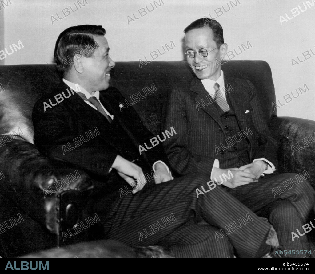 Foreign Minister Koki Hirota at left and Minister Akira Ariyoshi, Japanese Minister to China, are photographed here when they met for the first time at the office. The Minister returned here from Shanghai to report the recent situation in China. April 23, 1935. (Photo by Shimbun Rengo News Photos Service).