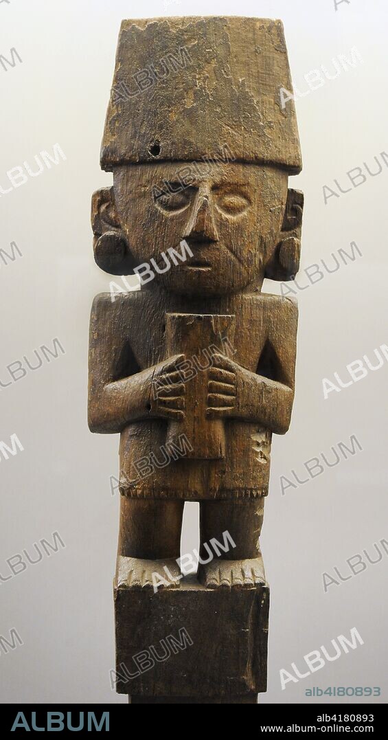 Wooden anthropomorphic figure. There were idols and depictions of ancestors In the temples and shrines. Chimu culture. Late Intermediate Horizon (1000-1470 AD). Peru. Museum of the Americas. Madrid, Spain.