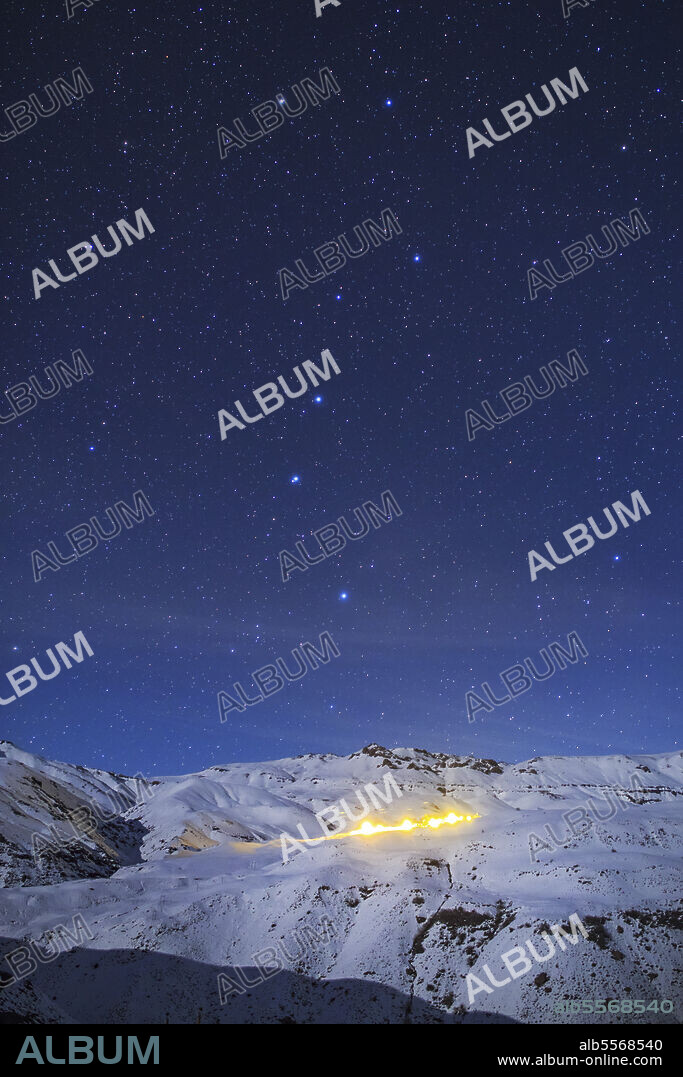 The Big Dipper in constellation Ursa Major, above a snow-covered Alborz Mountain Range in Iran. In Persia, this asterism is known as 7 brothers. The recognized star names of these stars are (up to down) Dubhe, Merak,, Phecda, Megrez, Alioth, Mizar/Alcor and Alkaid.