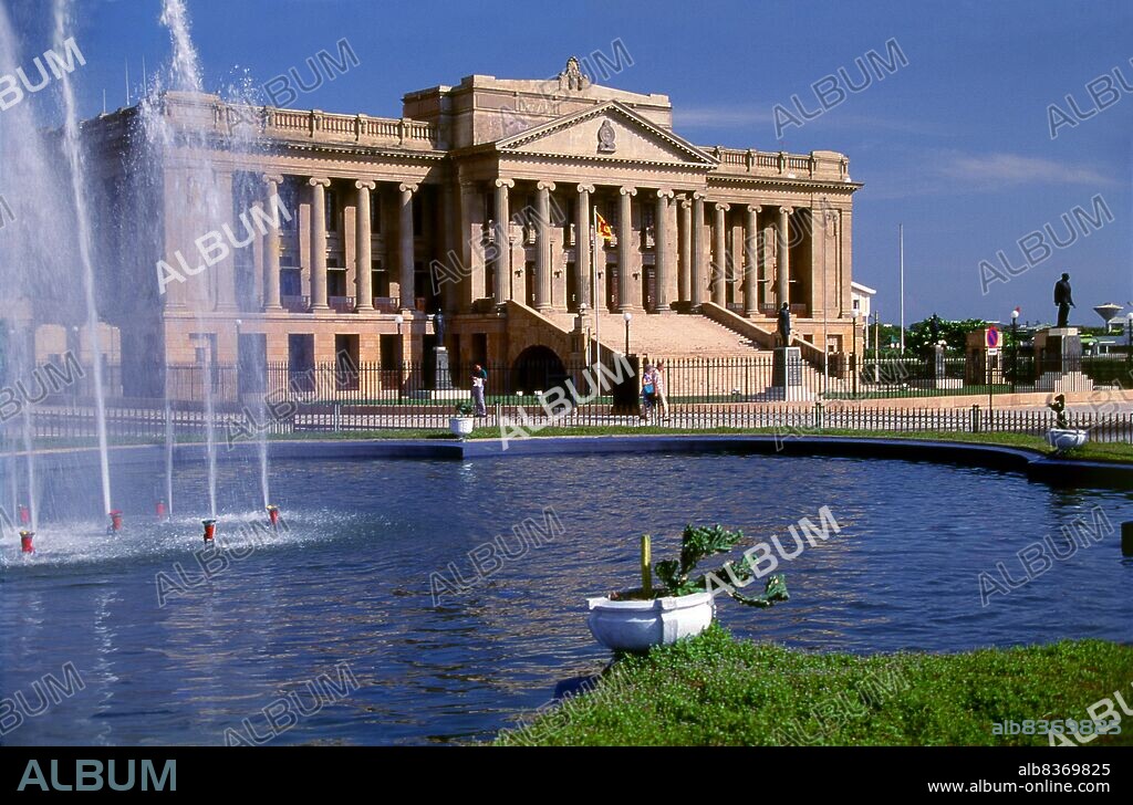 Colombo's Old Parliament Building was opened in 1930 by the then Governor Sir Herbert Stanley.<br/><br/>. Colombo is the largest city and former capital of Sri Lanka. It is located on the west coast of the island, adjacent to Sri Jayawardenapura Kotte, the capital.<br/><br/>. Colombo is a busy and vibrant city with a mixture of modern life and colonial buildings and ruins. It has a city population of 647,100 (2010). Due to its large harbour and its strategic position along the East-West sea trade routes, Colombo was known to ancient traders 2,000 years ago. However it was only made the capital of the island when Sri Lanka was ceded to the British Empire in 1815, and its status as capital was retained when the nation became independent in 1948.<br/><br/>. In 1978, when administrative functions were moved to Sri Jayawardenepura Kotte, Colombo was designated as the commercial capital of Sri Lanka. Like many cities, Colombo's urban area extends well beyond the boundaries of a single local authority, encompassing other municipal and urban councils. The main city is home to a majority of Sri Lanka's corporate offices, restaurants and entertainment venues. Famous landmarks in Colombo include Galle Face Green, Viharamahadevi Park and the National Museum.