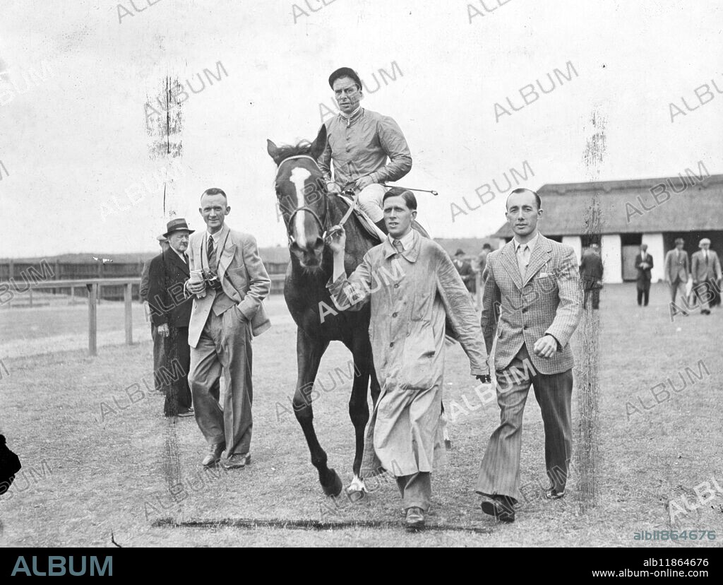 Mons. M. Boussao's Nirgal with C.Elliott in his saddle, is led in at Newmarket after winning the Princess of Wales's stakes at Newmarket today from the Aga Khan's Imphal (G. Richards) and M. Boussac's Goyama (Poincelet), third, outside. 3 July 1947.