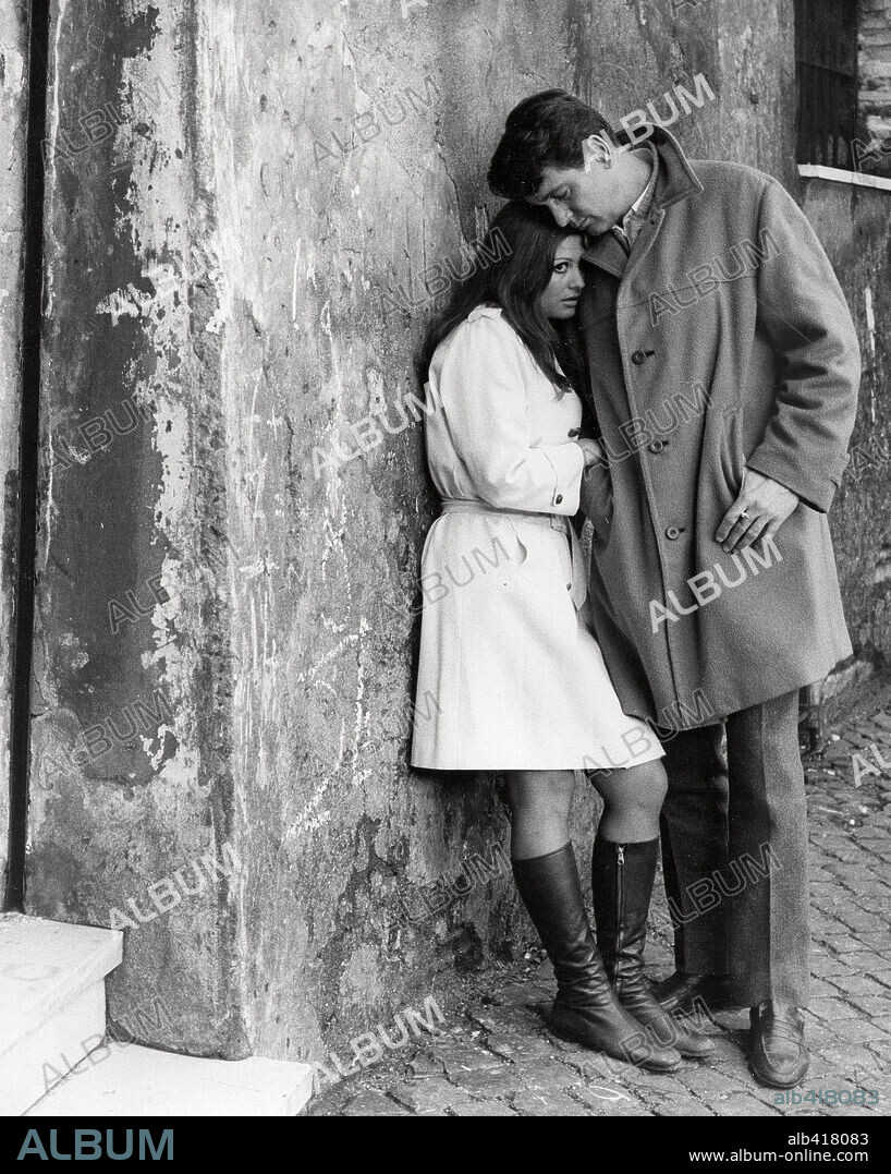 CLAUDIA CARDINALE and ROCK HUDSON in A FINE PAIR, 1969 (RUBA AL PROSSIMO TUO), directed by FRANCESCO MASELLI. Copyright VIDES / FRANCO CRISTALDI.