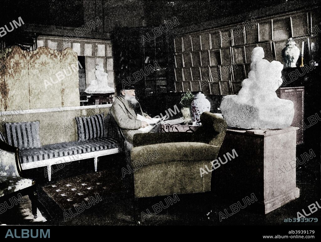 'Auguste Rodin Among His Books At 77 Rue De Varenne', c1900. French sculptor Auguste Rodin (1840-1917). From The Studio Volume 72. [London Offices of the Studio, London, 1917-18]. (Colorised black and white print).