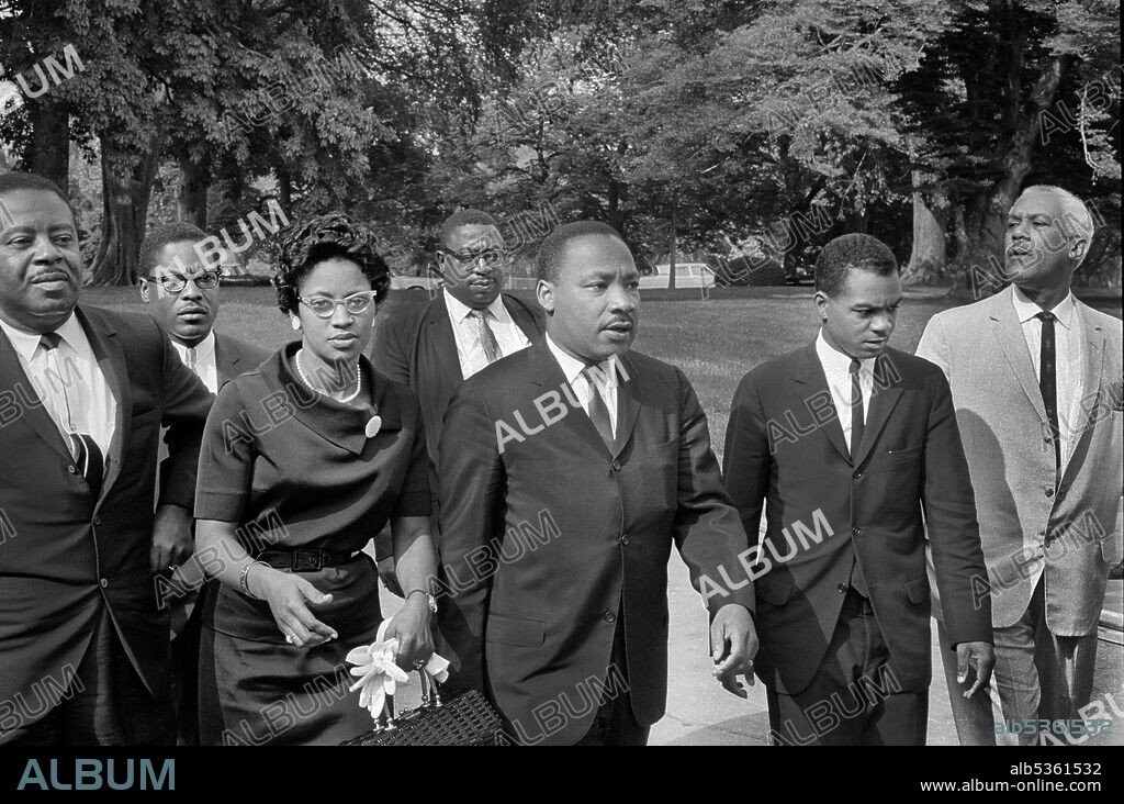 Ralph Abernathy (left), Martin Luther King, Jr. (center), John Lewis (2nd right) with group of people leaving White House after meeting with U.S. President Lyndon Johnson, Washington, D.C., USA, Marion S. Trikosko, August 5, 1965.