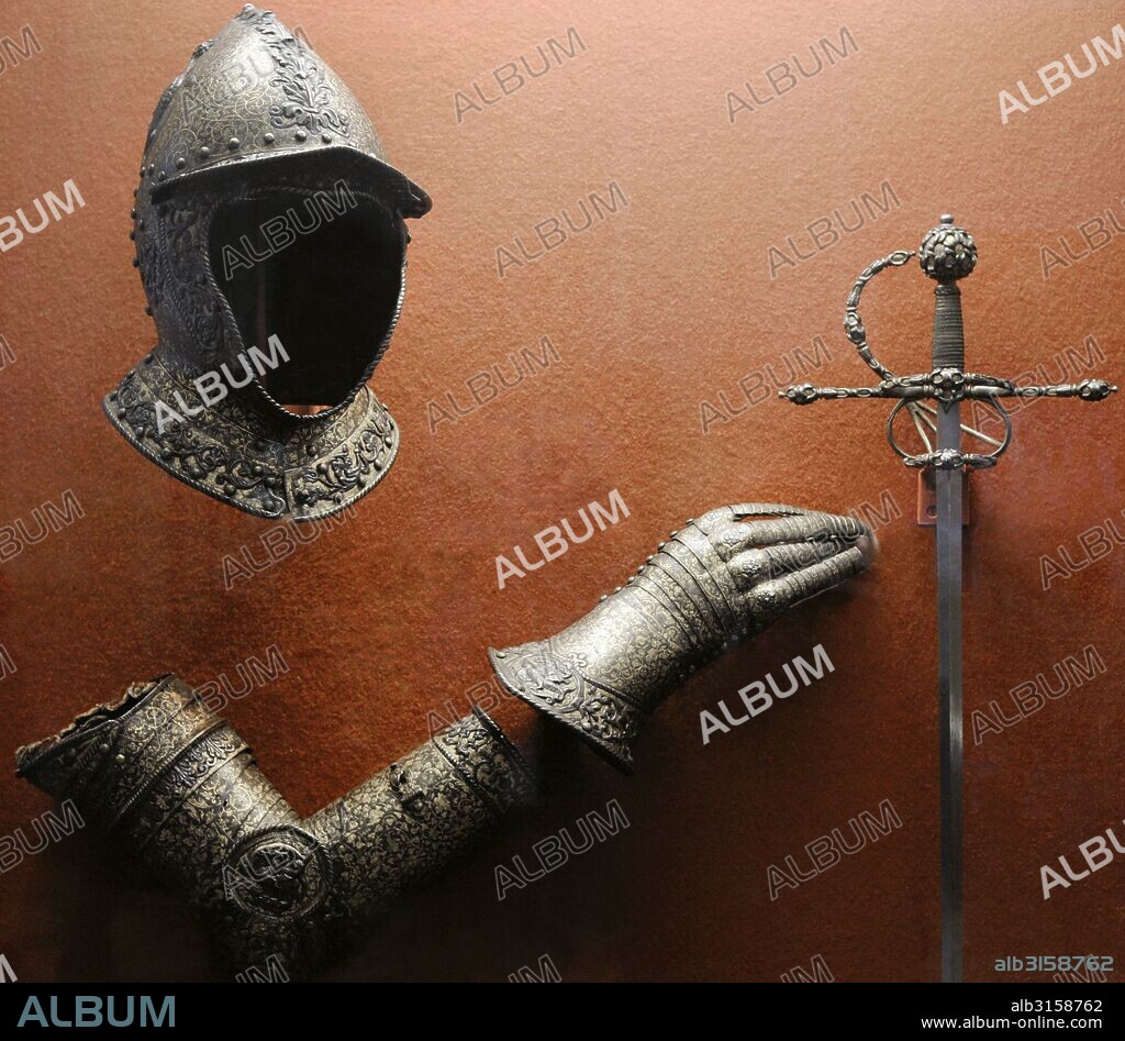 Parts of armor: helmet, vambrace or forearm guards and gauntlet. Ca. 1550-1560. Italy. Knights' Hall. The State Hermitage Museum. Saint Petersburg. Russia.