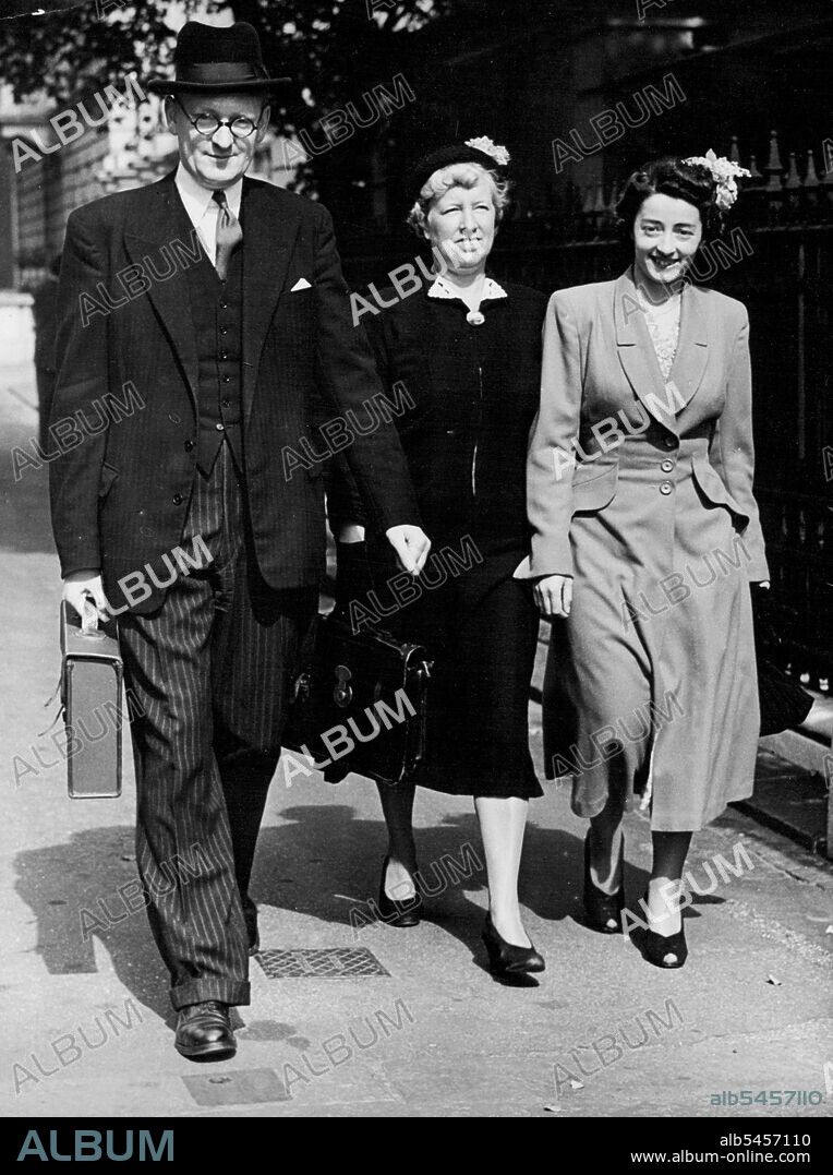 Princess Anne - The scene today as the registrar, Mr. Donald A. Boreham leaves Clarence House with Mrs. Lilian Smith (centre) and Mrs. Vera James an official of the welfare food office.When the Westminster Registrar, Mr. Boreham went to Clarence House today for The Duke of Edinburgh to complete the birth certificate of the baby Princess the names Anne Elizabeth Alice Louise were inspected. The proper name and title for the baby Princess will be H.R.H. Princess Anne Elizabeth Alice Louise of Edinburgh... The Princesses identity card and Ration Book have also been taken to Clarence House by Mrs. Lilian Smith of Westminster food office. August 29, 1950.