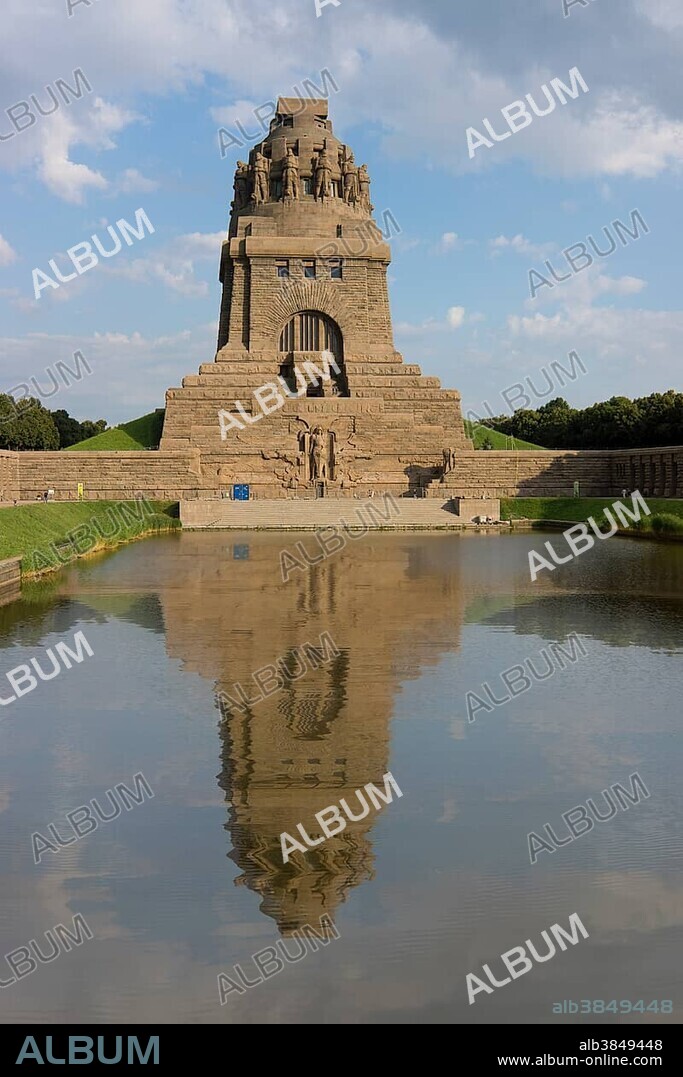 Monument to the Battle of the Nations, built to commemorate the Battle of Leipzig or the Battle of the Nations, reflected in the lake, Leipzig, Saxony, Germany, Europe.