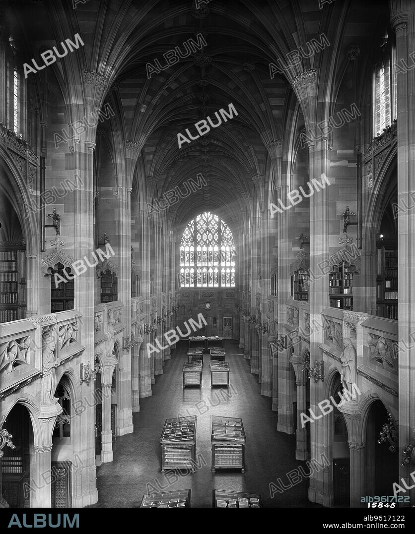 HENRY BEDFORD LEMERE. John Rylands Library, Deansgate, Manchester, 1900. Interior, looking east from the gallery. The library was completed in 1899 to the designs of architect Basil Champneys, and was commissioned by Enriqueta Augustina Rylands in memory of her late husband, a Manchester textile manufacturer and philanthropist. The library is a fine example of Victorian Gothic Revival architecture. It later became part of the University of Manchester.