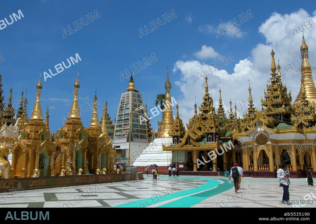 The golden stupa of the Shwedagon Pagoda rises almost 100 m (330ft) above its setting on Singuttara Hill and is plated with 8,688 solid-gold slabs. This central stupa is surrounded by more than 100 other buildings, including smaller stupas and pavilions. The pagoda was already well established when Bagan dominated Burma in the 11th century. Queen Shinsawbu, who ruled in the 15th century, is believed to have given the pagoda its present shape. She also built the terraces and walls around the stupa. The giant stupa has a circumference at platform level of 433 m (1,420ft), with its octagonal base ringed by 64 smaller stupas.