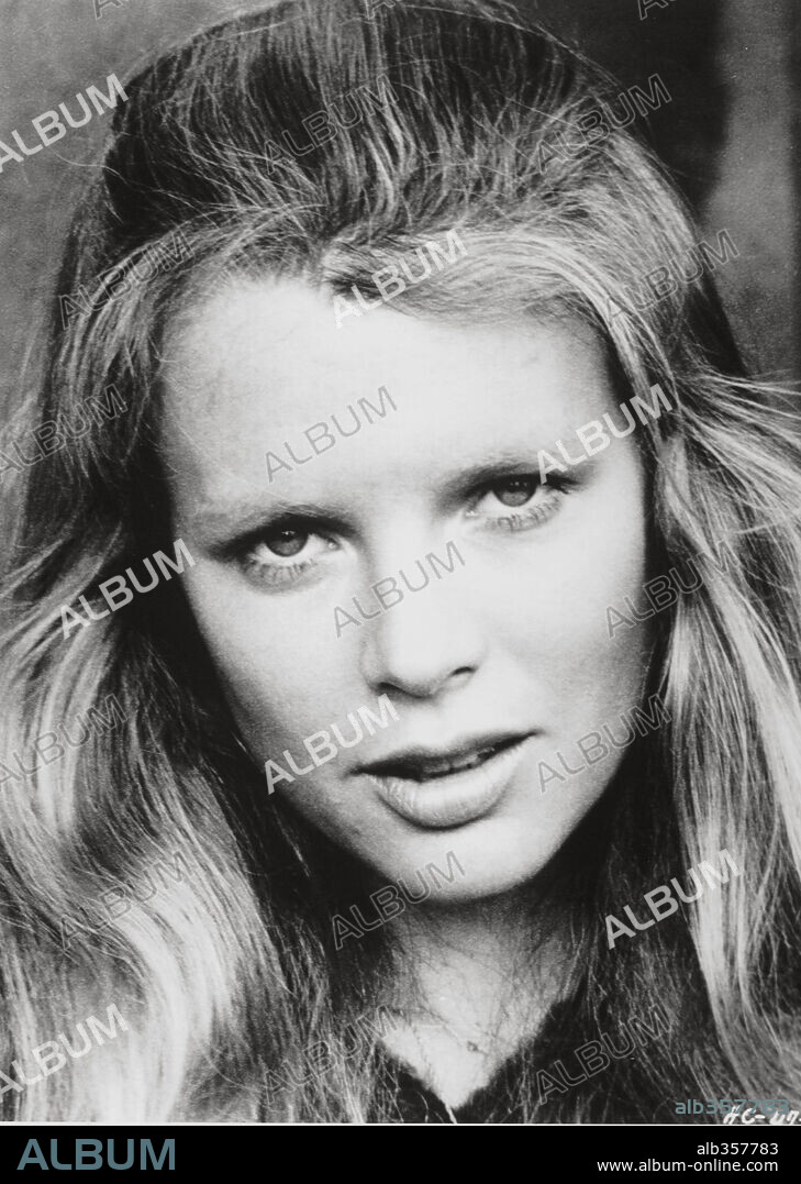KIM BASINGER.