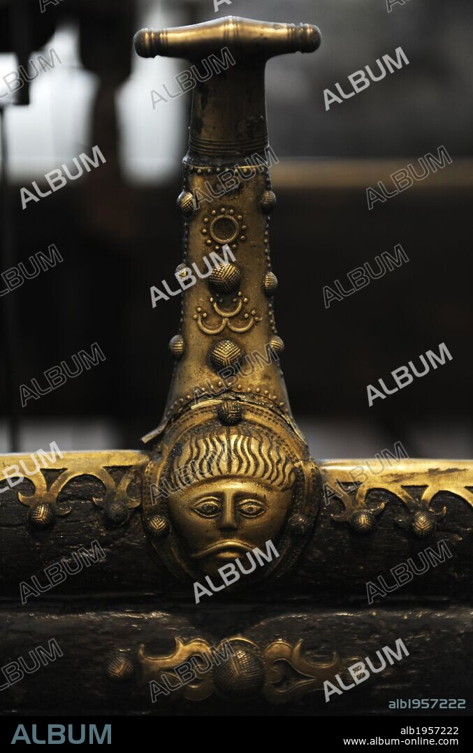 Prehistory. The Early Iron Age. The Dejbjerg Wagon. Carriage sacrificed in a west Jutland. Ceremonial carriages. Probably made in central Europe by Celtic artisans. 50 BC. The metal furnishings on the wagon body are ornamented with male faces with curly hair and moustache. National Museum of Denmark.