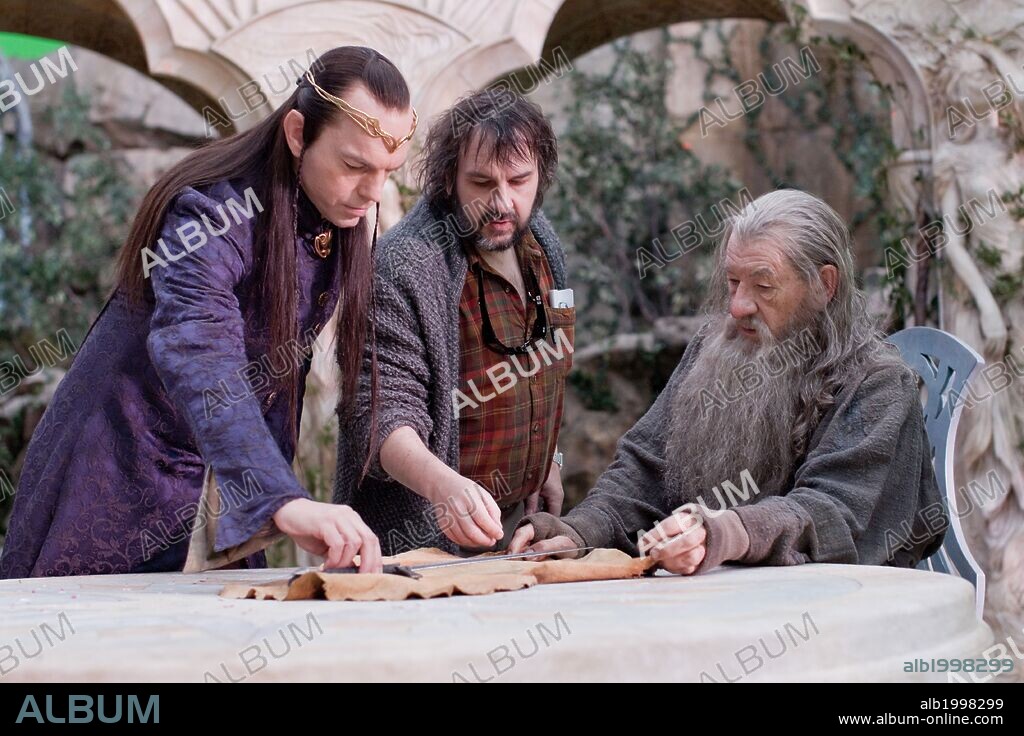 HUGO WEAVING, IAN McKELLEN and PETER JACKSON in HOBBIT, THE: AN UNEXPECTED JOURNEY, 2012, directed by PETER JACKSON. Copyright METRO GOLDWYN MAYER.
