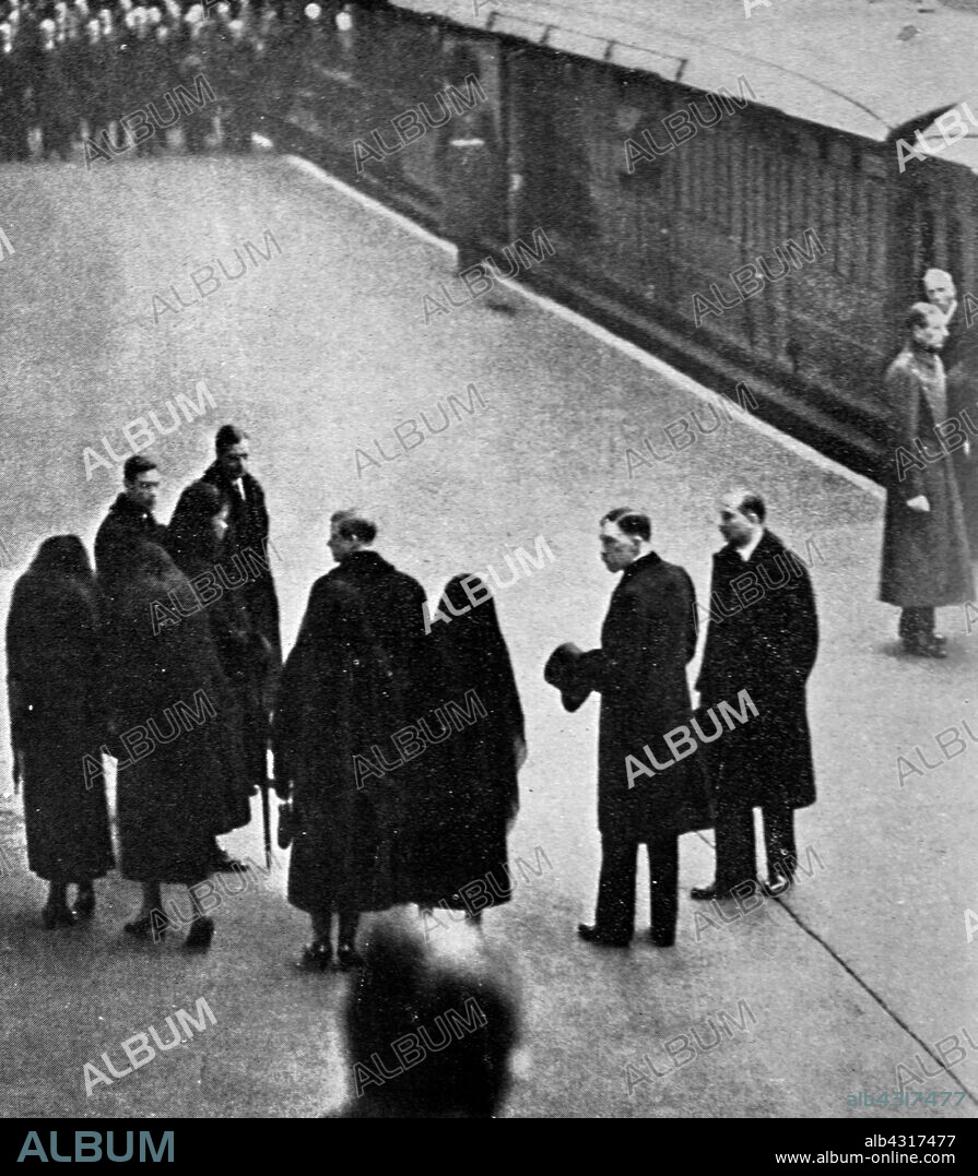 Queen Mary, the Princess Royal and the daughter's in law of the late King George V, wait for his coffin at King's Cross station London. Funeral of King George V (1936), King of the United Kingdom and the British Dominions, and Emperor of India, from 6 May 1910 until his death in 1936. the four sons of the late king (King Edward VIII, the Duke of York, the Duke of Gloucester and the Duke of Kent) take part in the state funeral.
