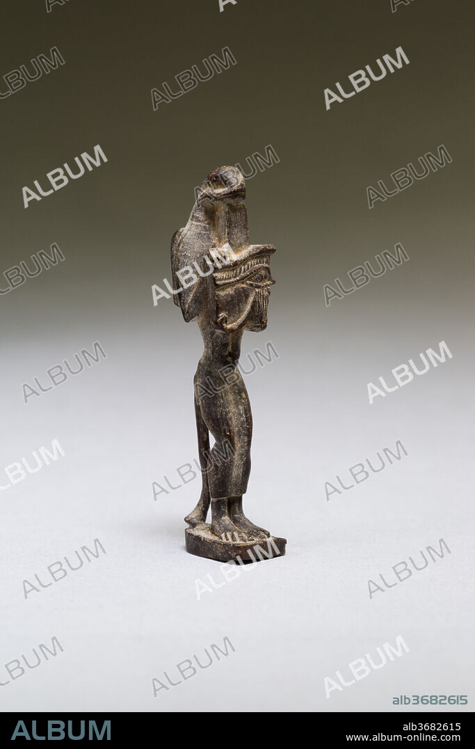 Nehebkau (snake deity) holding a wedjat eye. Dimensions: H. 3.8 × W. 0.8 × D. 1 cm (1 1/2 × 5/16 × 3/8 in.). Date: 664-30 B.C..
The small, finely detailed amulets 10.130.2439-.2445 are all made of wood. Wooden amulets are often gilded, but the only remaining gilding is on the goddess's sun disk (10.130.2443)..