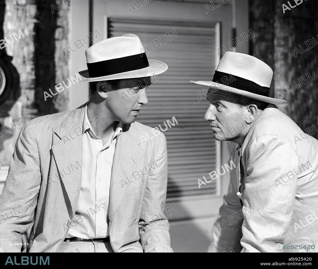 TRACY SPENCER and JAMES STEWART. JAMES STEWART and SPENCER TRACY in MALAYA, 1949, directed by RICHARD THORPE. Copyright M.G.M.