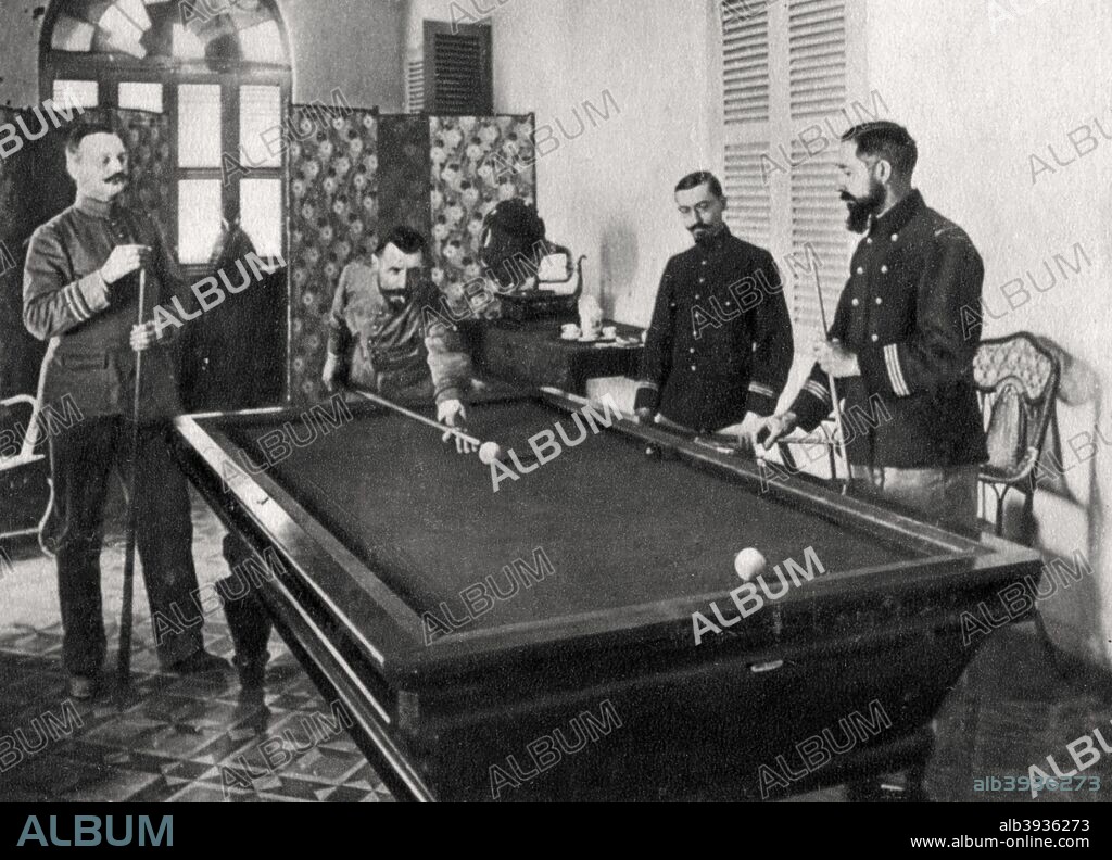 Henri Gouraud, French soldier, playing billiards, 1895. Gouraud (1867-1946) first came to prominence in French Sudan in the 1890s, where he succeeded in capturing Samori, leader of the resistance to the colonisation of the region by the French. Promoted to general in 1911, he fought in the First World War, losing an arm at Gallipoli. His 4th Army played a vital role in halting the German advance at the Second Battle of the Marne in July-August 1918. A photograph from Album de Photographies dans L'Intimite de Personnages Illustres, 1860-1920, 6th album, Editions MD, Paris.