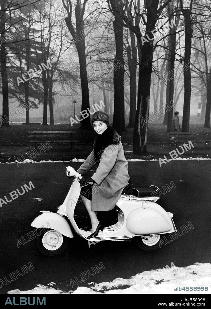 With vespa at the park. milan. Italy. 1958.