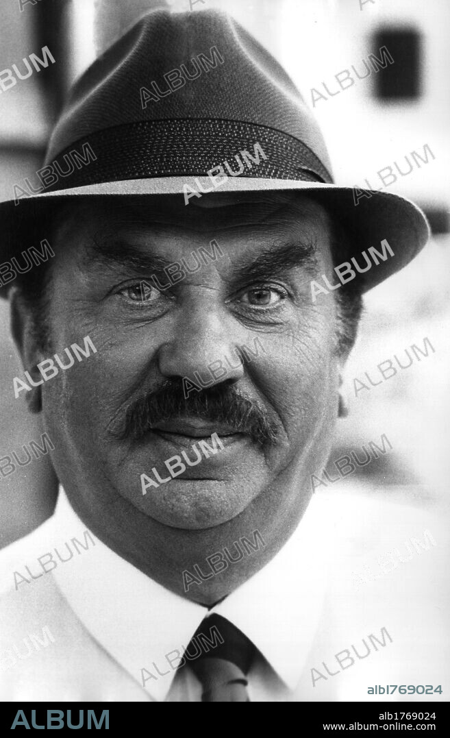 Gino Cervi on the set. The Italian actor Gino Cervi playing on the set of the film 'Don Camillo e i giovani d'oggi'. Rome, 1970.