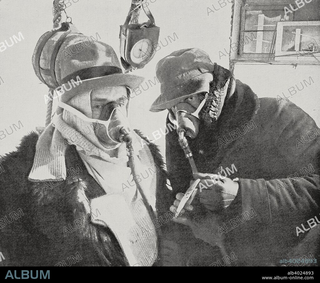 Maurice Bienaime, left, and Jacques Schneider (1879-1928), French aeronauts, wear oxygen masks in the first photograph taken above 10000 meters altitude, on the airship Icare, photograph by Albert Senouque from the magazine L'Illustration, year 71, no 3667, June 7, 1913.