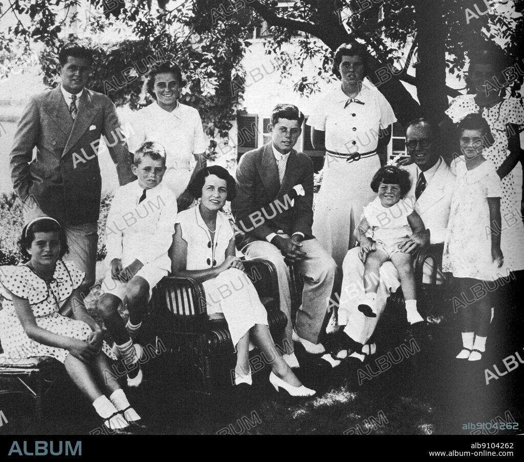 The family of Joseph and Rose Kennedy at Hyannis Port 1934 left to right standing Joe, Jr who was killed in World War II, Kathleen who was killed in plane accident in 1948 JFK (seated) Rosemary; Eunice. left to right seated Patricia, Robert, Rose, Joseph with Edward and Jean.
