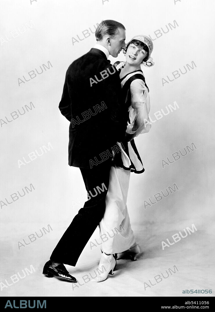 Vernon (May 2, 1887 - February 15, 1918) and Irene (Foote) Castle April 17, 1893 - January 25, 1969) were ballroom dancers and dance teachers who appeared on Broadway and in silent films. They are credited with reviving the popularity of modern dancing. The couple reached the peak of their popularity in Irving Berlin's first Broadway show, Watch Your Step (1914), in which they refined and popularized the Foxtrot. They also helped to promote ragtime, jazz rhythms and African-American music for dance. Irene became a fashion icon through her appearances on stage and in early movies. No photographer credited, 1913 (cropped and cleaned).