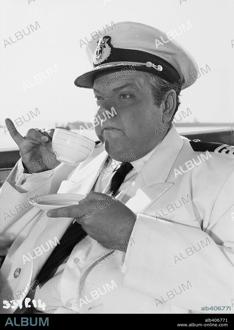 ORSON WELLES in FERRY TO HONG KONG, 1959, directed by LEWIS GILBERT. Copyright RANK.