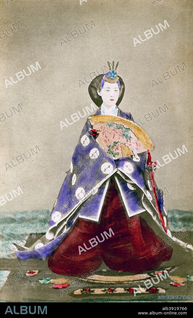 Haruho, Empress of Japan, 1873 (1882). The wife of the Emperor Meiji (Mutsuhito, Emperor of Japan) (1852-1912) Emperor of Japan from 1867, pictured in full court dress. A pioneer of Japanese photography, Uchida Kyuichi was the first and only photographer to be given the opportunity to take the portraits of the emperor and empress. A photograph from Labor and Porcelain in Japan, by the United States Consul-General, Yokohama, 1882.