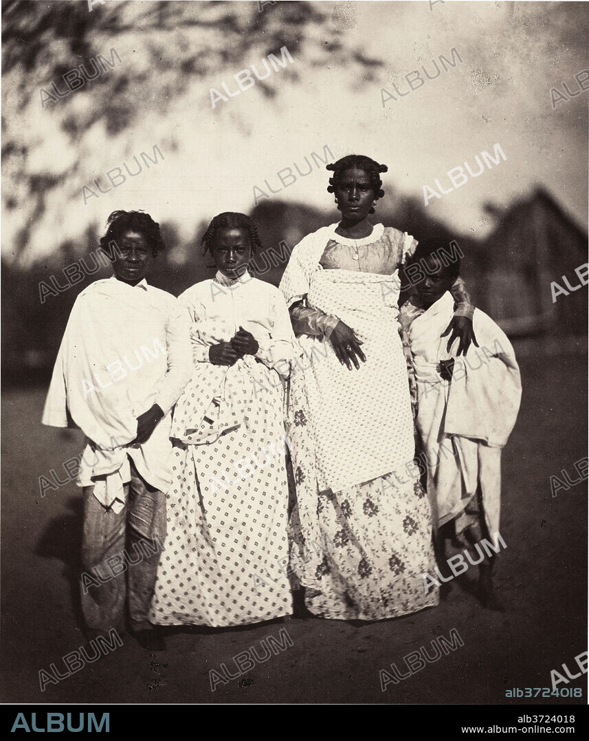 DÉSIRÉ CHARNAY. Femme Malgache et Ses Enfants (Madagascan Woman and Her Children) (Plate 3). Dated: 1863. Dimensions: image: 21 x 17.6 cm (8 1/4 x 6 15/16 in.)  sheet: 42.6 x 29.9 cm (16 3/4 x 11 3/4 in.). Medium: albumen print.