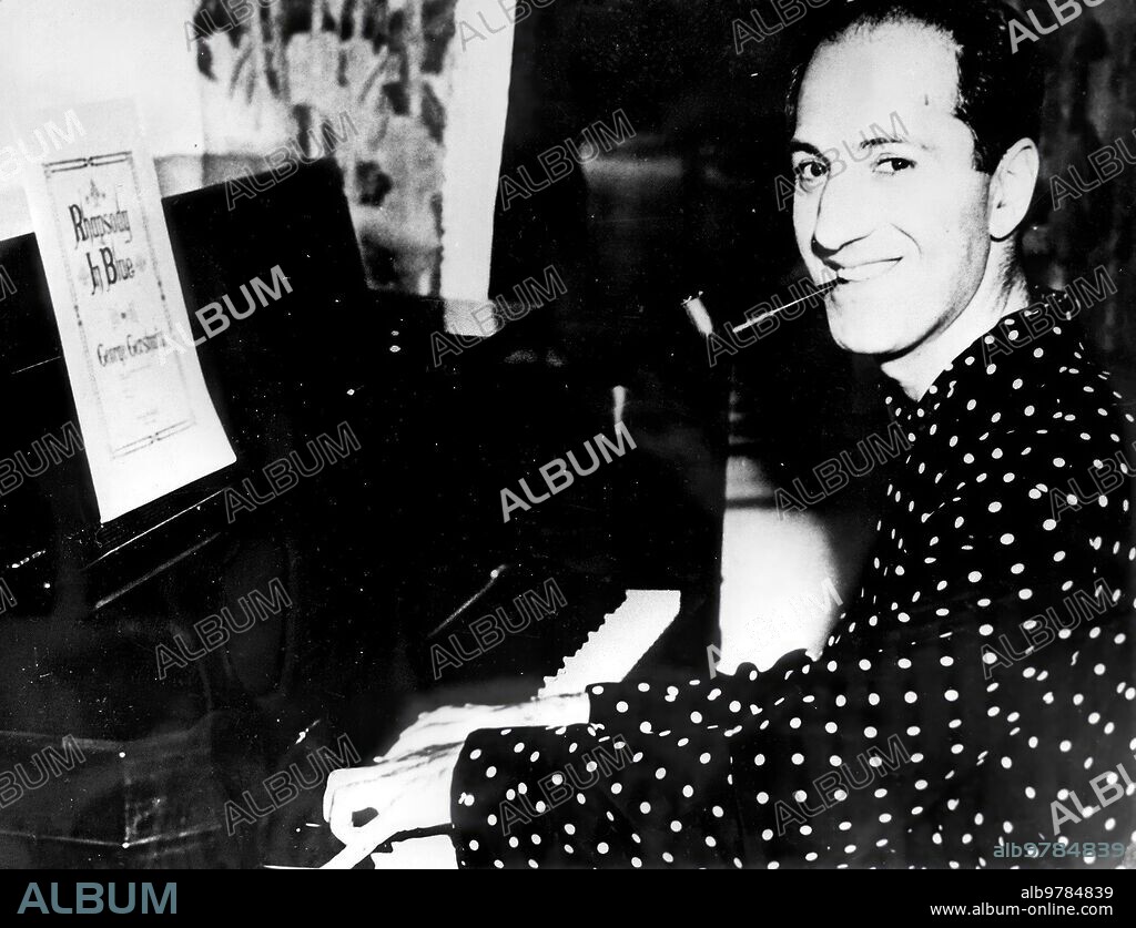 In Seattle, (Washington), in 1936, the famous American composer GEORGE GERSHWIN practices his famous "Rhapsody in Blue" on the piano.