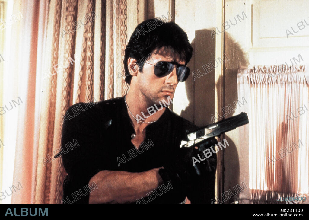 SYLVESTER STALLONE in COBRA, 1986, directed by GEORGE P. COSMATOS. Copyright WARNER BROTHERS.