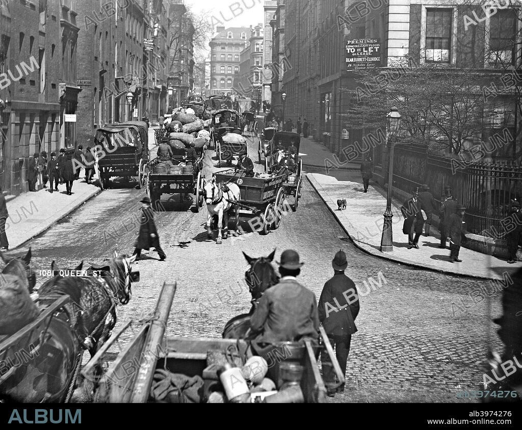 Horse-drawn vehicles in Queen Street, London, EC4, 1870-1900. A policeman directs the traffic in central London. Even before the car was a common feature of the roads traffic congestion was a serious problem in major cities. Modern London traffic does not travel significantly faster than these carts.