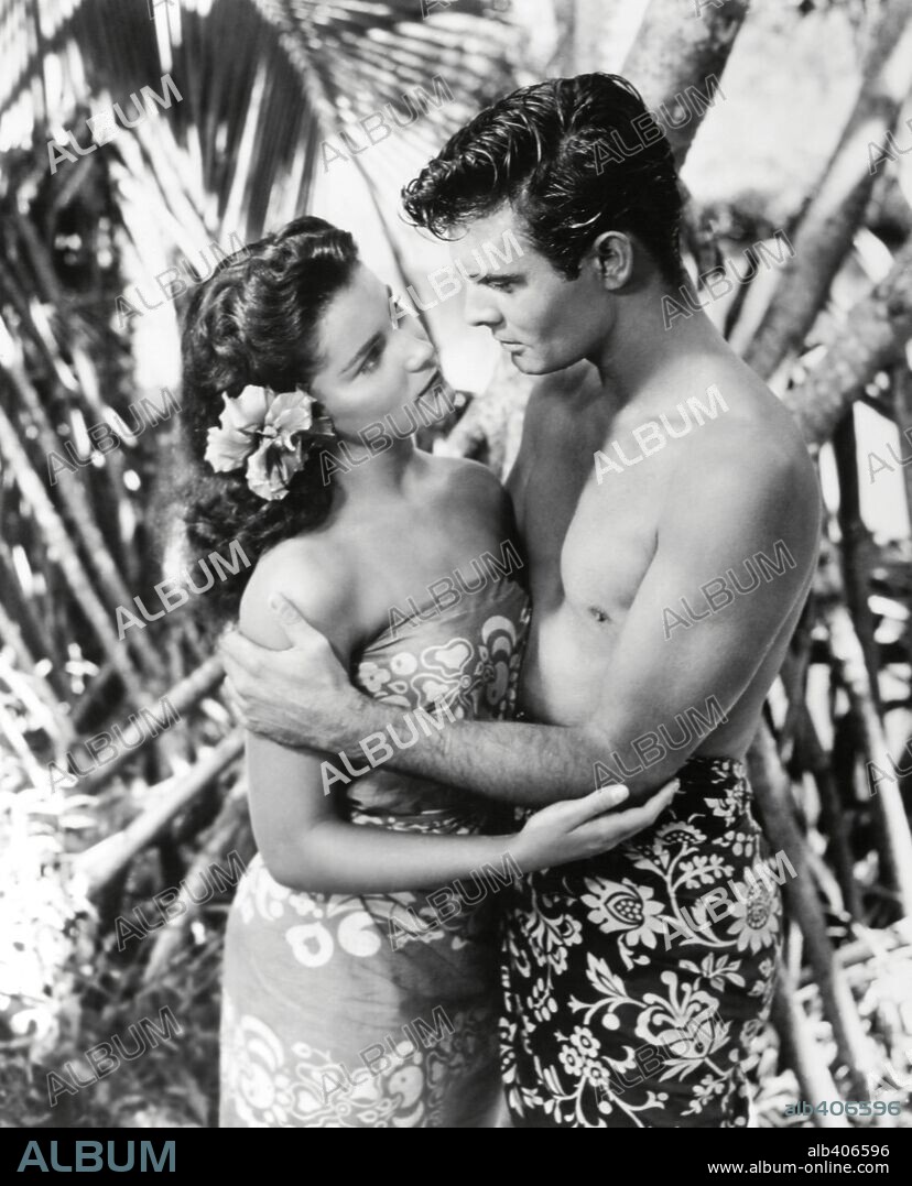 DEBRA PAGET and LOUIS JOURDAN in BIRD OF PARADISE, 1951, directed by DELMER DAVES. Copyright 20TH CENTURY FOX.