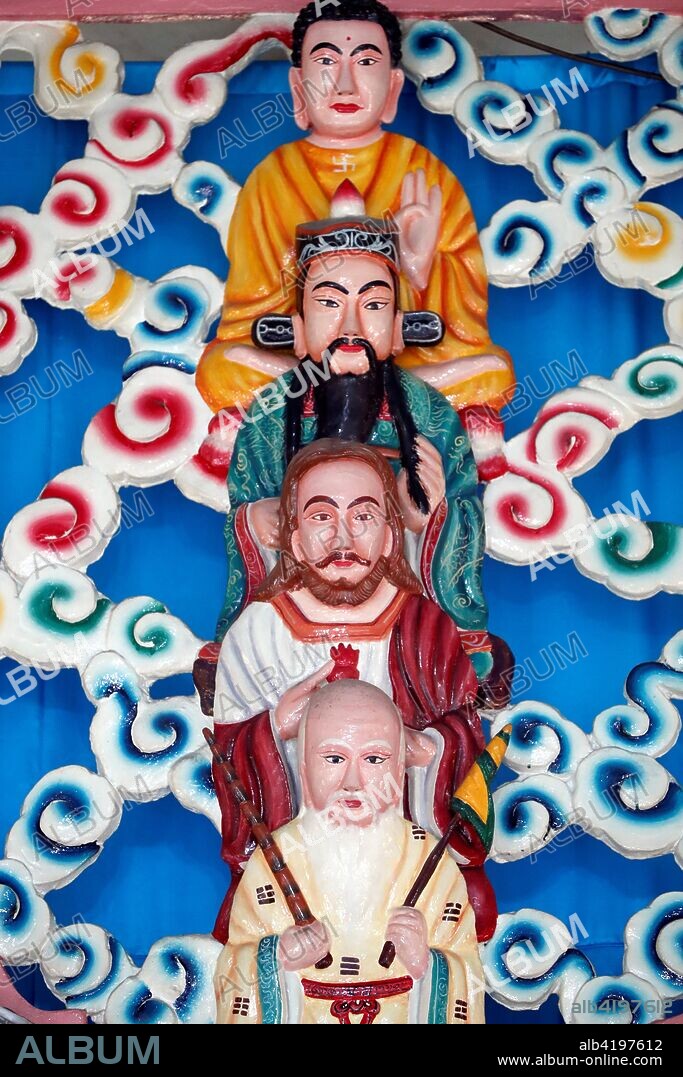 Cao Dai temple. Lao Tseu, Jesus, Bouddha and Confucius. Cai be. Vietnam.
