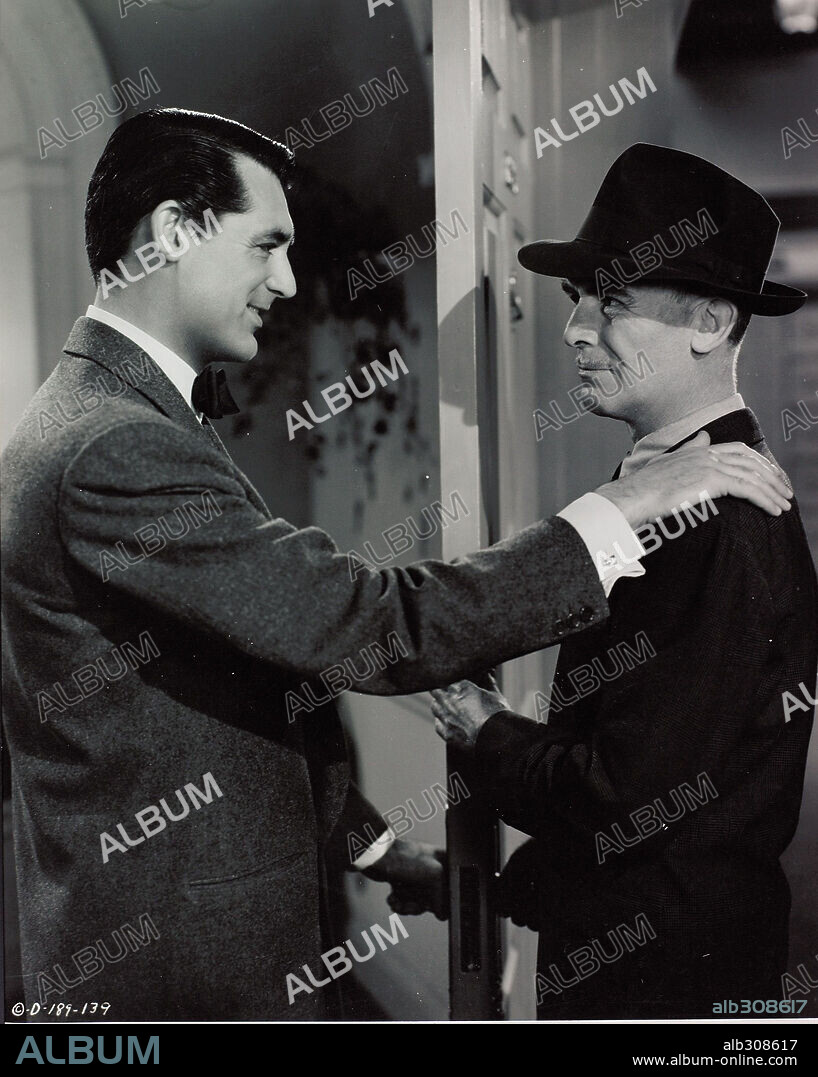 CARY GRANT and JAMES GLEASON in ONCE UPON A TIME, 1944, directed by ALEXANDER HALL. Copyright COLUMBIA PICTURES.