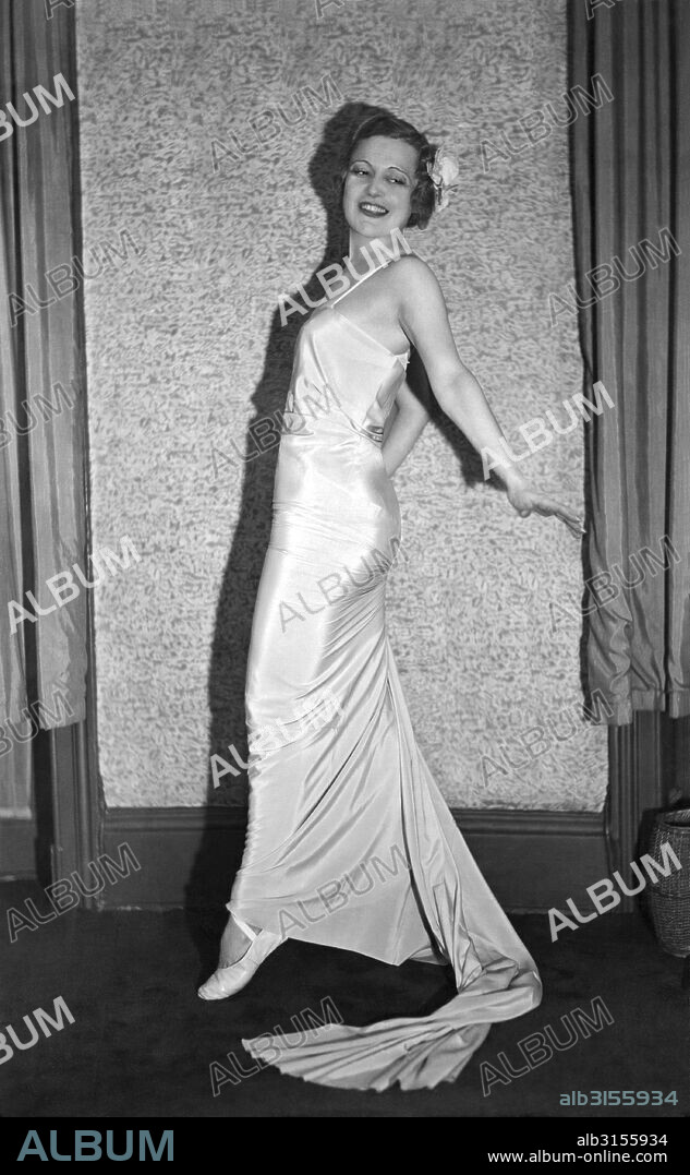 London, England:  c. 1935. Romanian Princess Irene Bogdan struts across the room.