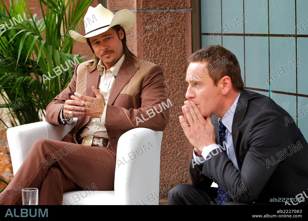 BRAD PITT and MICHAEL FASSBENDER in THE COUNSELOR, 2013, directed by RIDLEY SCOTT. Copyright CHOCKSTONE PICTURES.