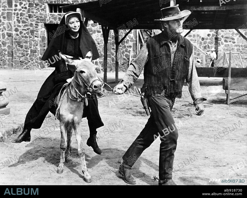 CLINT EASTWOOD and SHIRLEY MACLAINE in TWO MULES FOR SISTER SARA, 1970, directed by DON SIEGEL. Copyright UNIVERSAL/MALPASO.