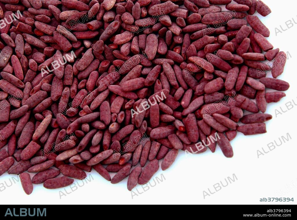 Red yeast rice is the product of yeast (Monascus purpureus) grown on steamed rice, and is served as a dietary staple in some Asian countries. Red yeast rice was a commonly used red food colouring in East Asian and Chinese cuisine prior to the discovery of chemical food colouring. It has also been used in Chinese herbal medicine.