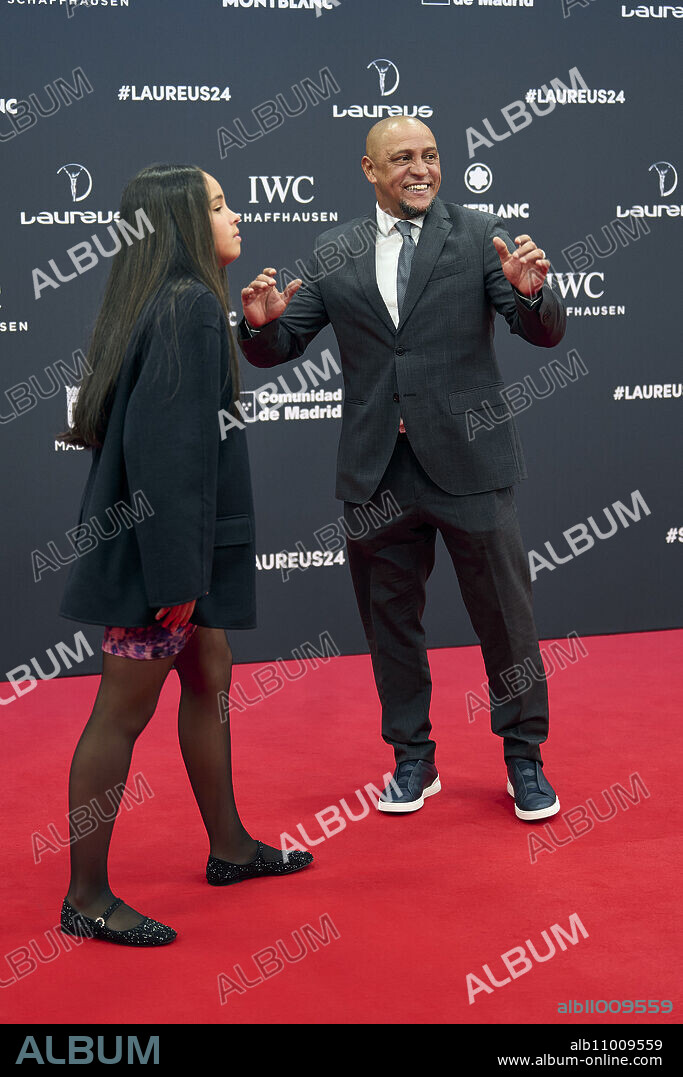 Roberto Carlos, Rebeca da Silva Rocha attends Laureus World Sports Awards Madrid 2024 - Red Carpet at Palacio de Cibeles on April 22, 2024 in Madrid, Spain.