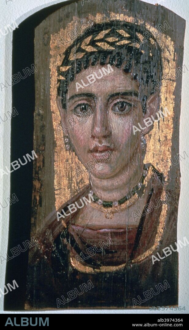 Mummy portrait of an Egyptian woman, c1st-3rd century. The use of personalised mummy portraits of this type in Ancient Egypt began during the Roman period. Known as Fayum portraits, they are encaustic paintings, made with hot, pigmented wax on wooden panels, which were inserted into the mummy of the deceased person. From the collection of the Metropolitan Museum of Art, New York.