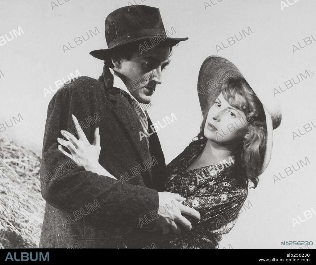 SILVANA MANGANO and VITTORIO GASSMAN in BITTER RICE, 1949 (RISO AMARO), directed by GIUSEPPE DE SANTIS. Copyright LUX/DE LAURENTIIS.